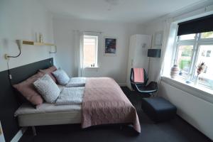 Postel nebo postele na pokoji v ubytování Billesgade Rooms