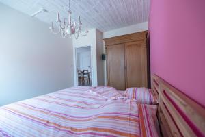 Postel nebo postele na pokoji v ubytování Vakantiewoningen Pomona