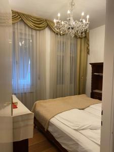 Posteľ alebo postele v izbe v ubytovaní Bellevue City Apartment Budapest