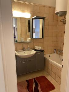 Kúpeľňa v ubytovaní Bellevue City Apartment Budapest