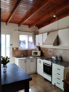 A kitchen or kitchenette at SAN GONZALO