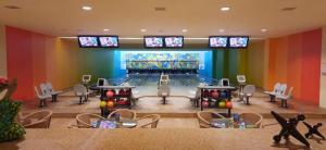 a bowling alley with a bowling pin in a room at Pico de Loro Jacana B in Nasugbu