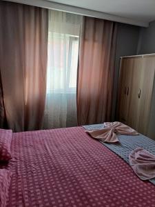 Łóżko lub łóżka w pokoju w obiekcie Piem park hotel