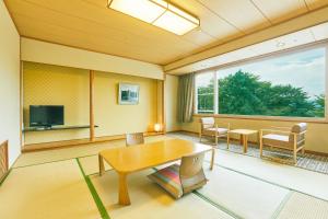 TV a/nebo společenská místnost v ubytování KAMENOI HOTEL Fukui + 37 fotografií