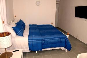 Ένα ή περισσότερα κρεβάτια σε δωμάτιο στο Dominican Suite 11, Amazing Apt/Studio (DS11)
