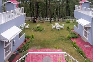 Zahrada ubytování StayVista at Pines & Spruce - Exclusive getaway