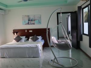 Postel nebo postele na pokoji v ubytování Clouds Beach Retreat Laamu Gan + 22 fotografií