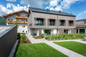 Ogród w obiekcie NEUWIRT - Boutiquehotel & Wirtshaus