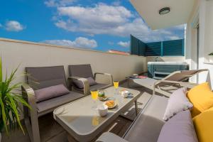 Posezení v ubytování New Deluxe jacuzzi apartment Ana