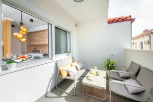 Posezení v ubytování New Deluxe jacuzzi apartment Ana