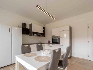 Cuisine ou kitchenette dans l'établissement Relax House Harta