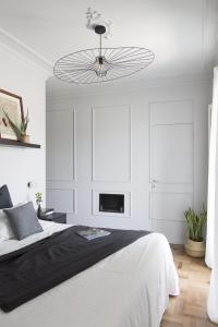 Voodi või voodid majutusasutuse Easylife - Milano - Crocefisso 1 P7 - Historic Center toas