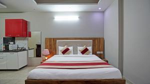 Kuchyň nebo kuchyňský kout v ubytování The Palm Suites - Medicity