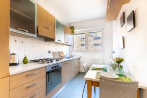 Dapur atau dapur kecil di Appartamento Bicocca - Affitti Brevi Italia