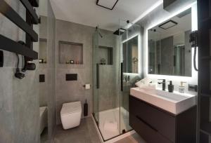 Kúpeľňa v ubytovaní Apart Invest Centrum Park 13 + 30 fotografií
