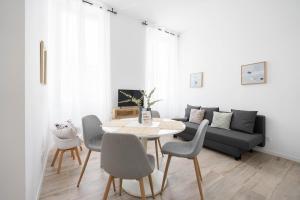Część wypoczynkowa w obiekcie Le Complexe Concorde - 3 Apartments 16 pers Vélodrome Terrasse Clim
