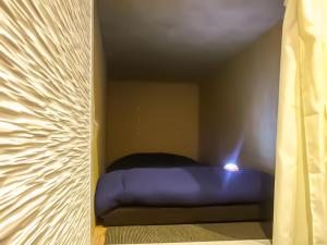 Relak Guest House 登別 Station客房内的一张或多张床位