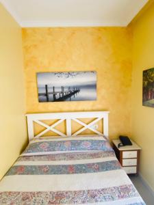 Postel nebo postele na pokoji v ubytování Hostal L'Anfora