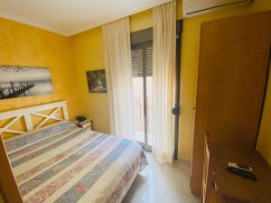 Postel nebo postele na pokoji v ubytování Hostal L'Anfora