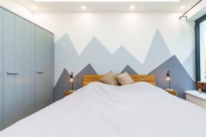 Postelja oz. postelje v sobi nastanitve Apartmán SKI Plešivec
