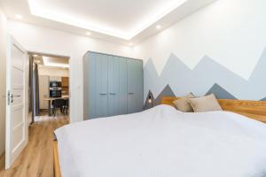 Postelja oz. postelje v sobi nastanitve Apartmán SKI Plešivec