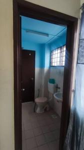 Een badkamer bij XLC LODGE - Bandar Putra Permai - Selangor - Malaysia