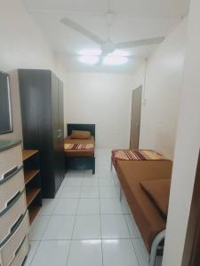 Katil atau katil-katil dalam bilik di XLC LODGE - Bandar Putra Permai - Selangor - Malaysia