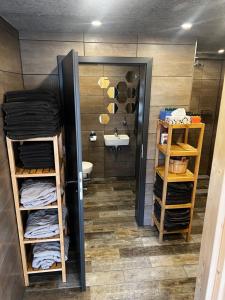 a bathroom with a sink and a toilet and a sink at Ferienhaus Kompass (ehemals Pension Hohlen) in Carolinensiel +51 photos