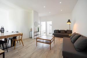 Część wypoczynkowa w obiekcie Le Complexe Concorde - 3 Apartments 16 pers Vélodrome Terrasse Clim