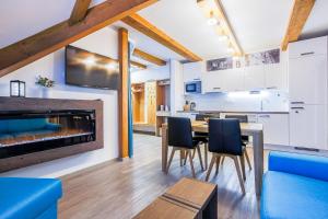 Kuchyňa alebo kuchynka v ubytovaní Ski Chalet Klínovec