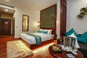 Voodi või voodid majutusasutuse Lotus Blanc Resort toas