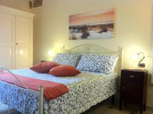 Postel nebo postele na pokoji v ubytování Porta Piccola B&B