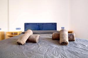 A bed or beds in a room at My Favorite Home