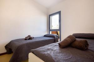 A bed or beds in a room at My Favorite Home