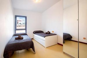 A bed or beds in a room at My Favorite Home