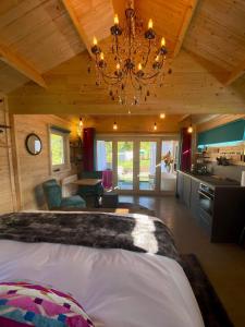 Postel nebo postele na pokoji v ubytování Dunroamin Lodges