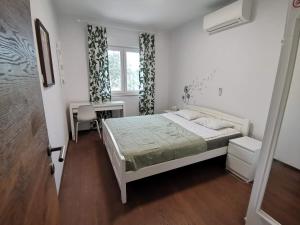 Postel nebo postele na pokoji v ubytování Villa Oliva