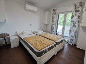Postel nebo postele na pokoji v ubytování Villa Oliva