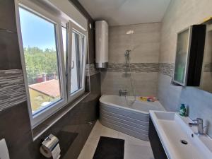 Koupelna v ubytování Villa Oliva