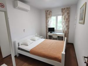 Postel nebo postele na pokoji v ubytování Villa Oliva