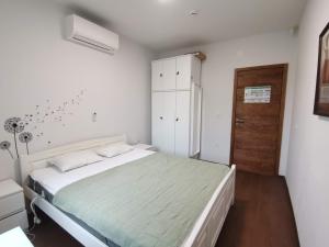 Postel nebo postele na pokoji v ubytování Villa Oliva