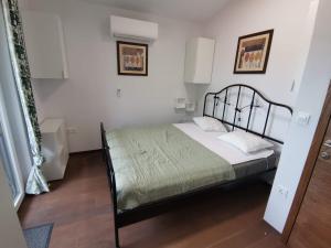 Postel nebo postele na pokoji v ubytování Villa Oliva