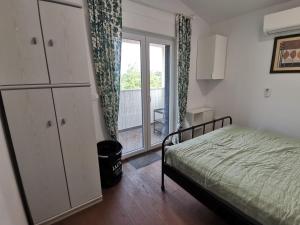 Postel nebo postele na pokoji v ubytování Villa Oliva