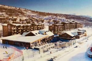 a rendering of a resort in the snow at Topp moderne familiehytte på Beitostølen (bygget i 2019) in Beitostøl