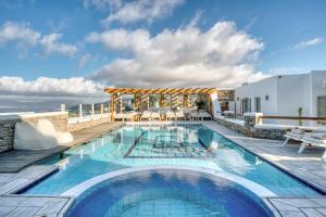 a swimming pool on the roof of a building at Damianos Mykonos Hotel in Mýkonos City