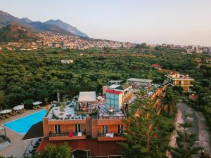 an aerial view of a house with a swimming pool at Apollo Resort Art Hotel in Kyparissia
