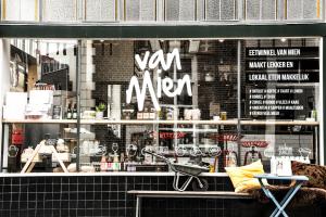 a store window with a cart in front of it at Villa Wanrooy in Doetinchem