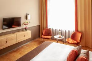 TV a/nebo společenská místnost v ubytování Hotel Elba am Kurfürstendamm - Design Chambers