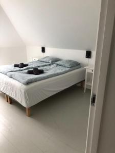 Postel nebo postele na pokoji v ubytování Fløien Apartments