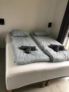 Postel nebo postele na pokoji v ubytování Fløien Apartments